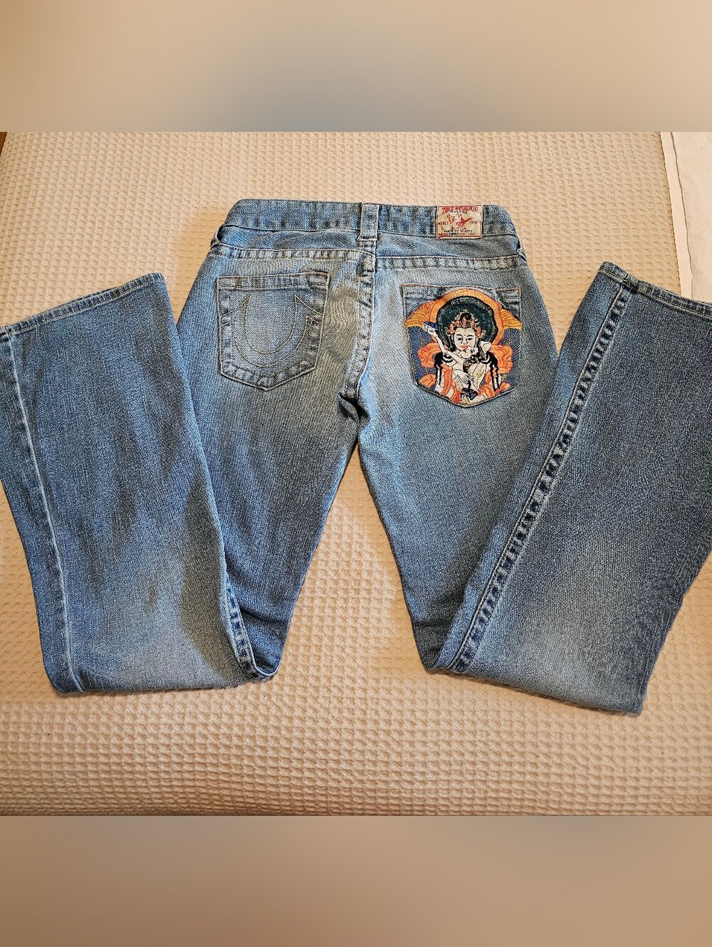 Embroidered Light Blue Women’s Jeans with Decorative Back Pocket